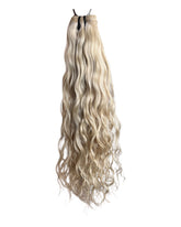 Extensions Cheveux Bouclés NahaHair – Blond #613, 100 % cheveux humains, texture naturelle